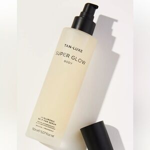 New tan-luxe super glow body gradual hyaluronic self-tan serum 150ml.